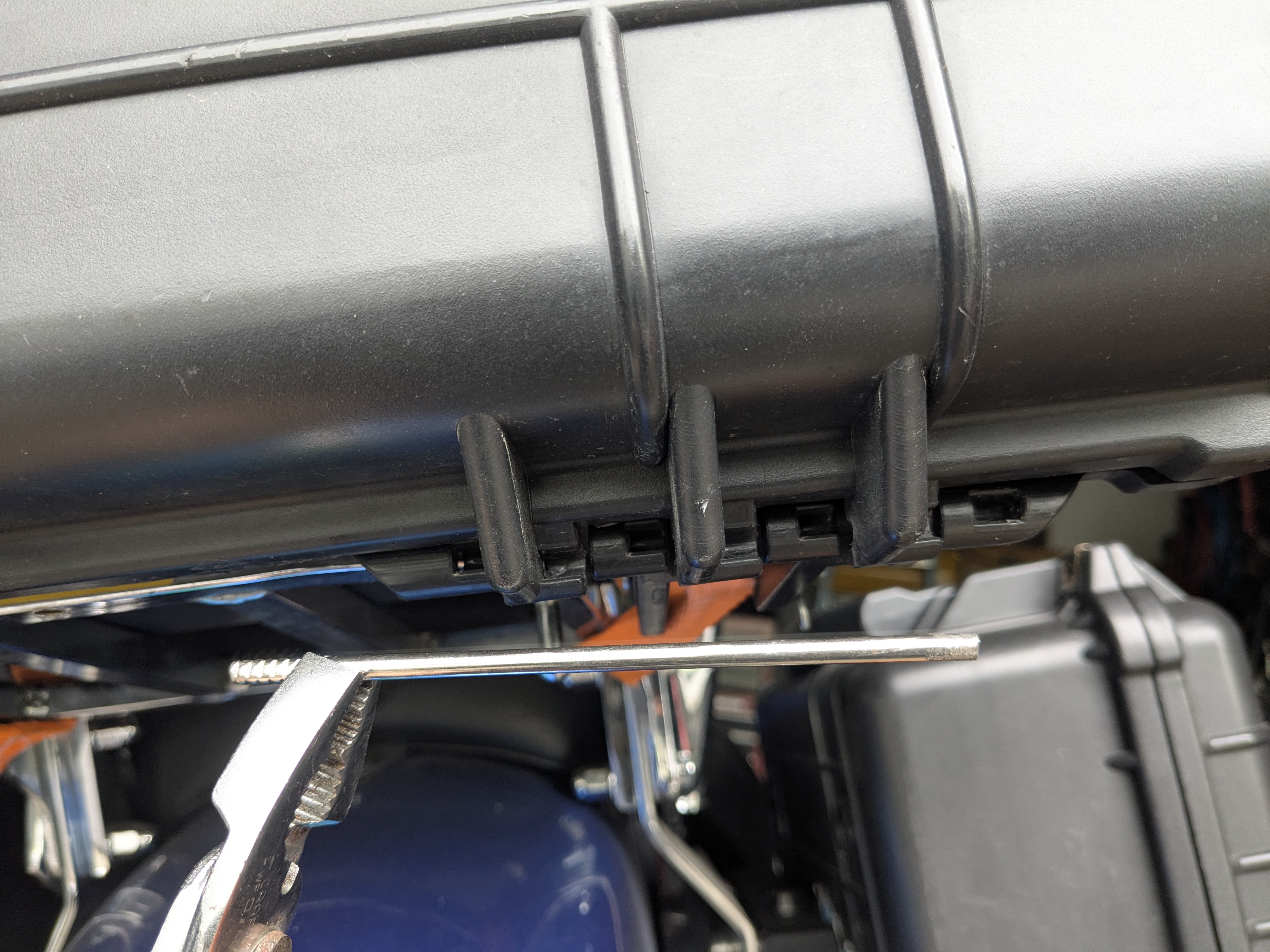 Pulling the factory hinge pin out of the case hinge